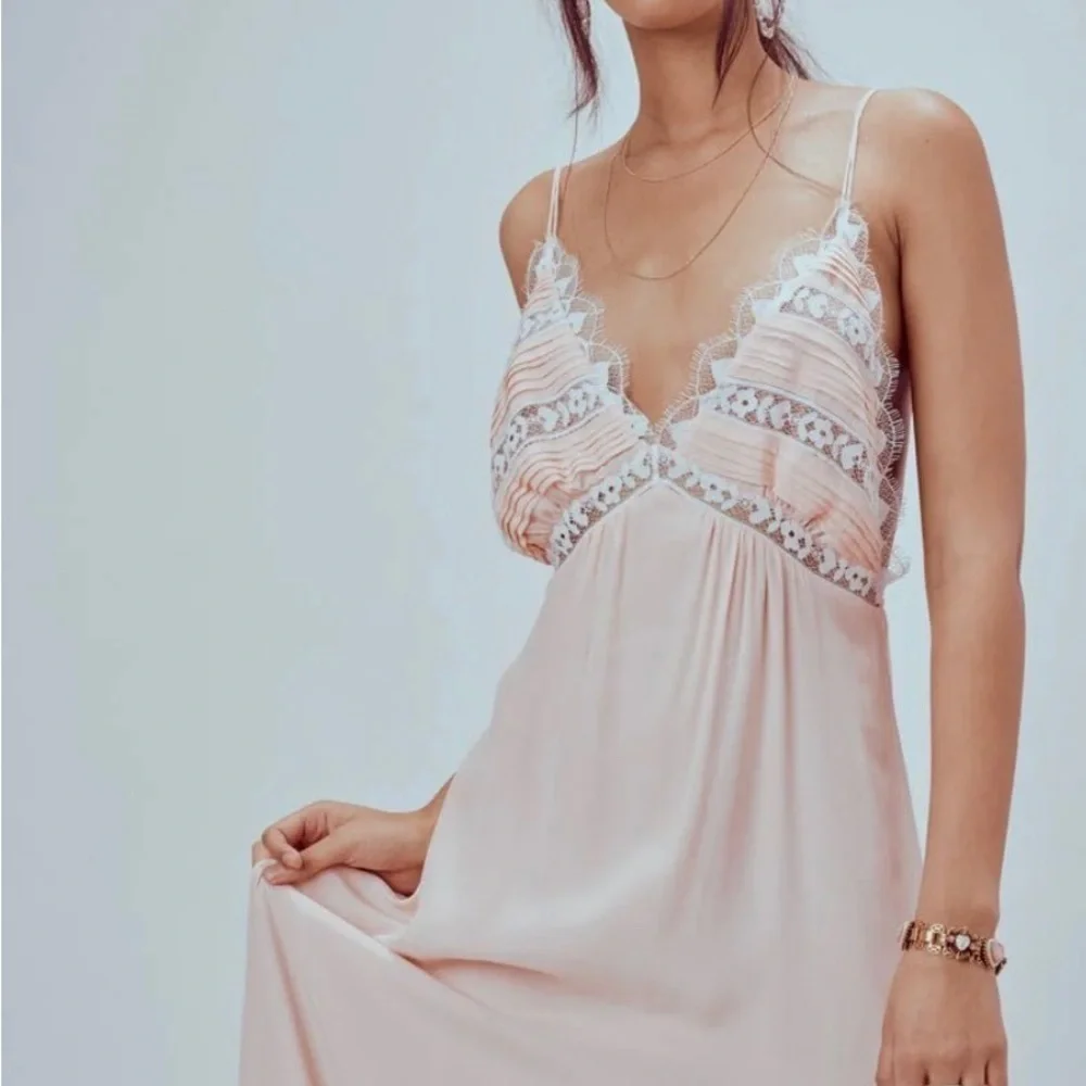 Elegant  Lace Maxi Dress by Free People lovebird. dress is white! Not blush